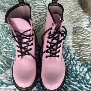 Pink doc martens. Worn once still need to be fully broken in